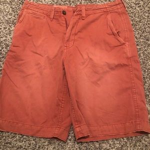 Coral/pinkish longer length shorts